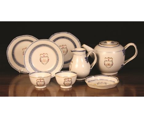 A Qianlong Period Part Teaset, decorated with monogrammed shields surrounded by delicate garlands of polychrome enamelled flo