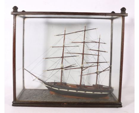 Wooden model of a three masted sailing ship in glazed wooden case, case size 38cm x 32cm x 16cm&nbsp; 