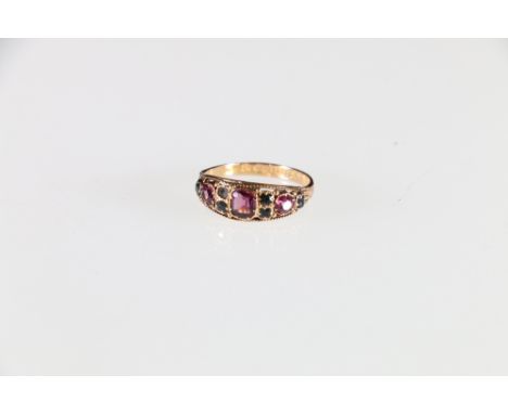 15ct yellow gold emerald and ruby dress ring with engraved shank, stamped 625 and 15 to interior, 2.00gCondition Report:The s