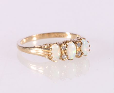 9ct yellow gold diamond and opal dress ring, size O, 2.46g 