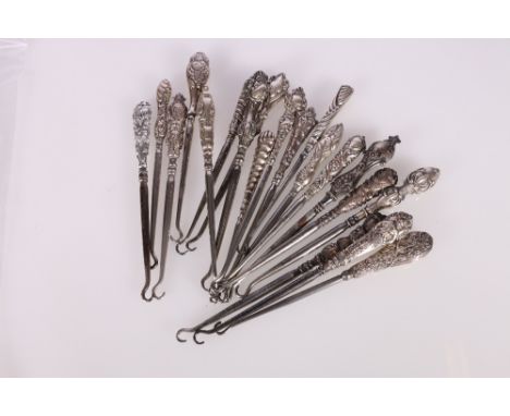 Twenty silver handled buttonhooks 