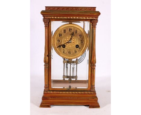 French four glass mantel clock in coppered brass case having mercury pendulum, works stamped AI and Made in Paris, 28cm tall 