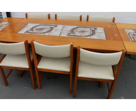 Farstrup Danish teak dining room suite, the tile top table with two additional leaves and six side chairs 