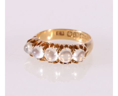 18ct yellow gold moonstone ring set with a row of five hemispherical moonstones, ring size N/Q, 4.8g Hallmarks very clean. Sh