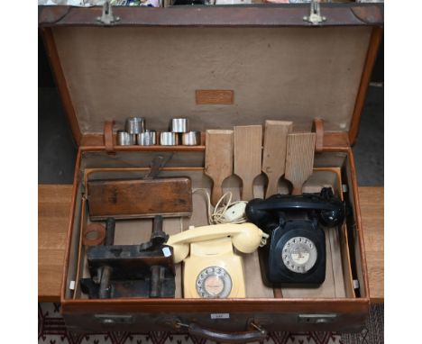A German vintage leather suitcase, labelled for Moritz Muller, Leipzig, to/w two vintage telephones, a set of six EP Air Mini