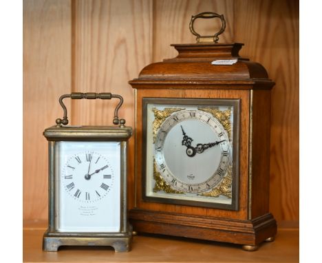 A brass carriage clock a/f, to/w an Elliott walnut mantel clock (2) 