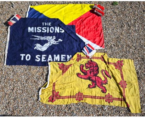 Various vintage and later linen flags including two Union flags, Royal Standard of Scotland, two red ensigns and Mission to S