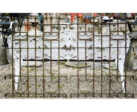 A pair of ornate antique cast iron railing panels, each 86 cm w x 111 cm h (2) 