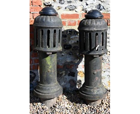 Ham Baker &amp; Co, Westminster S.W., a pair of substantial cast iron bollard form ventilators, with removable tops, approx. 