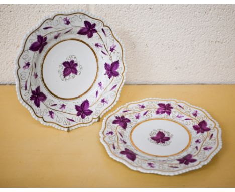 Two Flight, Barr &amp; Barr Royal Porcelain Works Worcester plates, painted and gilded with puce foliage, 22 cm diam 