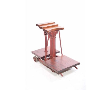 A set of vintage iron potato scales, by W & AT Avery LtdThe scales of typical form with central iron shaft mounted on a frame
