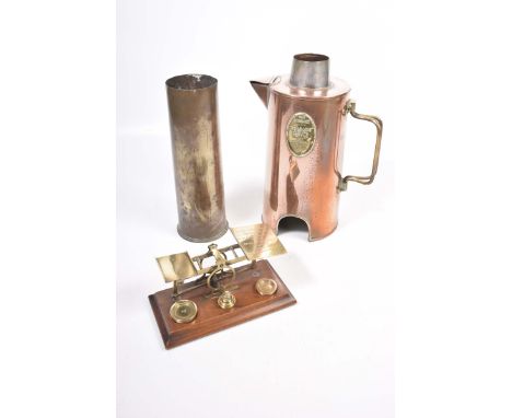 A collection of brass and copper wareTo include the Sirram "Volcano" quick boil kettle, a World War l 18lb brass shell case a