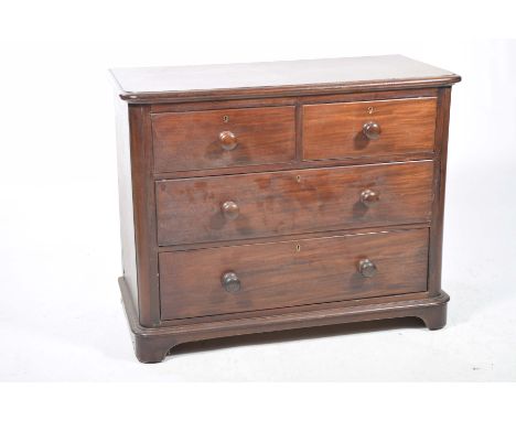 A Victorian mahogany chest of drawersThe rectangular moulded top with rounded corners above two short and two long drawers wi