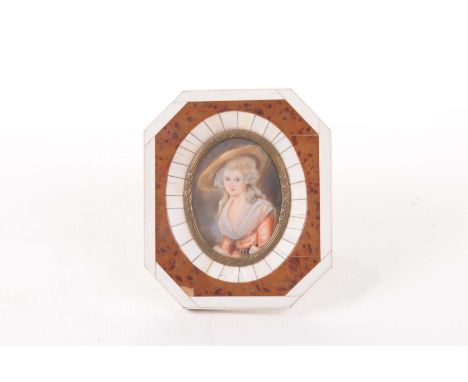 A 19th Century ivory portrait miniatureThe oval miniature painted with depiction of Miss Bingham, dressed in wide brimmed hat