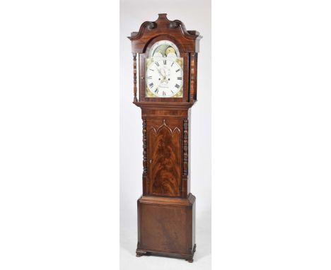 An 18th/19th Century mahogany longcase clock, by W.M. Jones, ManchesterThe case with a twin swan neck pediment over a break a