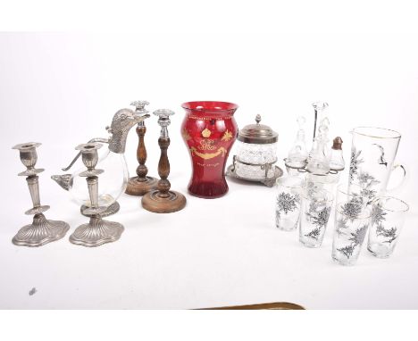A white metal mounted duck shaped glass decanter, late 20th CenturyFurther items to include a pair of oak and chrome candlest