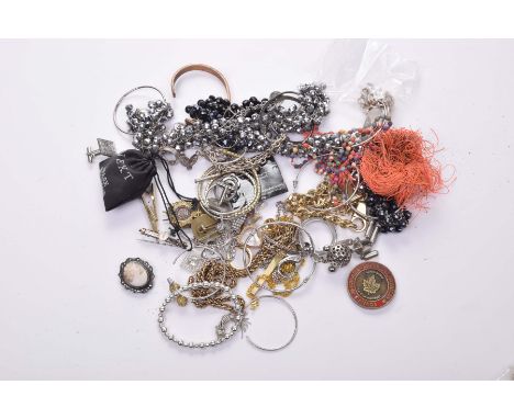 A collection of costume jewelleryTo include; a Stuart Weitzman bracelet, a Michael Kors dress ring, a 9k gold and mother of p