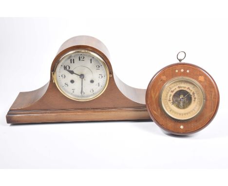 A wooden Napoleon hat mantle clock, early to mid 20th CenturyMovement with coil chime, brushed steel face with Arabic numeral