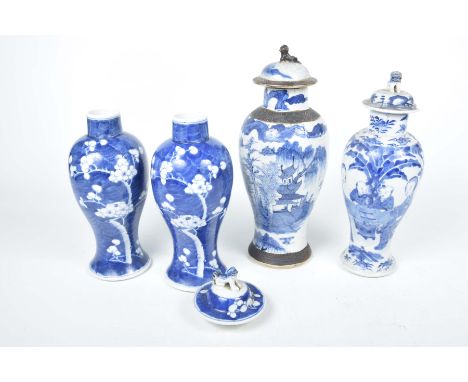 Four Chinese blue and white vases, 20th CenturyTo include a pair of baluster shaped vases, prunus pattern with a domed cover,