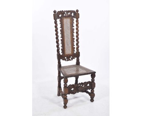 A Victorian oak hall chairCarved with a Phoenix and leafy crest above a rattan panel flanked by barley twist uprights above a