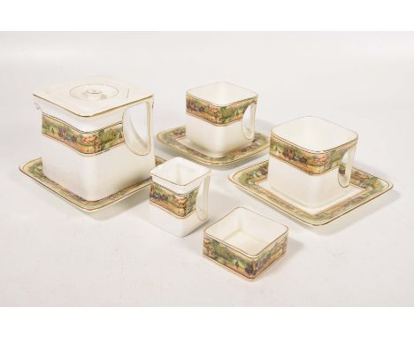 A mid 20th Century Cube tea service by Foley ChinaEach piece decorated with a frieze depicting a coaching scene and with an i