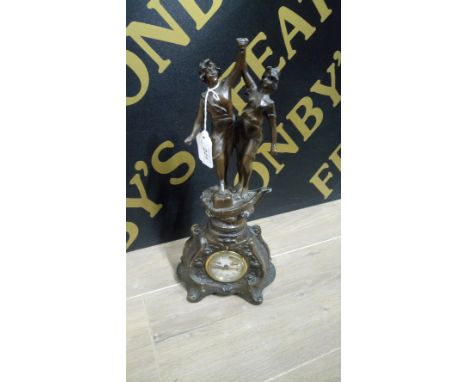 VINTAGE METAL FIGURES CLOCK