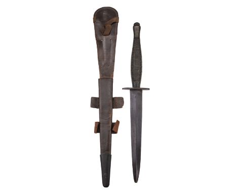 * Fighting Knife. A WWII Fairbairn-Sykes 'Beaded and Ribbed' pattern fighting knife, 16.5 cm blued steel blade (tip rounded),