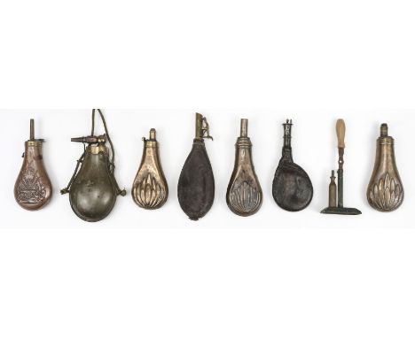 * Powder Flasks. A collection of powder flasks, including a Victorian horn and brass example, of bag shape form with copper p