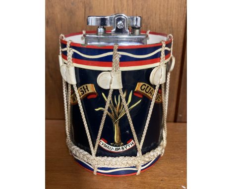 * Welsh Guards. A novelty table lighter in the form of a corded regimental drum circa 1960s, painted in the traditional fashi