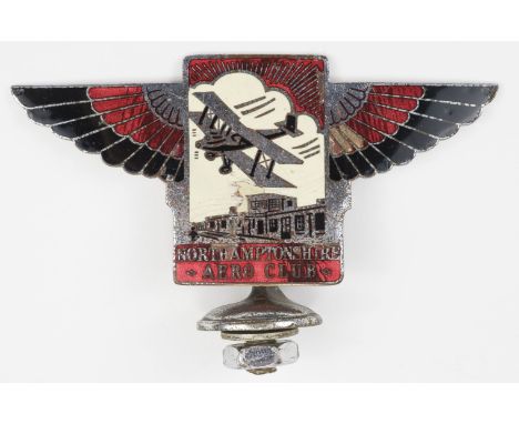 * Car Badge. Northamptonshire Flying Club, circa 1930s, pre-war members' car badge showing a Biplane flying over the art deco