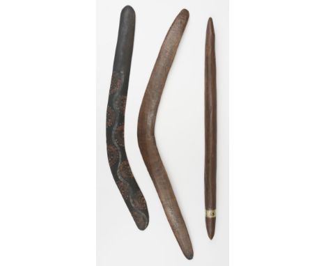 * Tribal Art. An Australian Aboriginal throwing club, elongated hardwood with a Christie's label (12 December 1989, lot 63), 