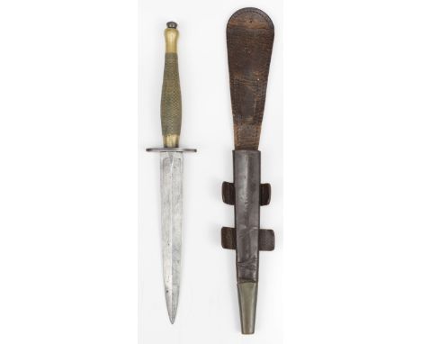 * Fighting Knife. A WWII Wilkinson Sword 2nd Pattern Commando Knife, the 17.5 cm blade with trade mark at the forte, the oppo