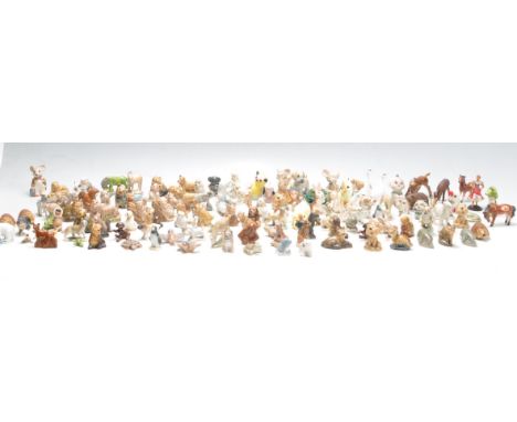 A large collection of vintage 20th century ceramic porcelain Whimsies / Wade figurines / cabinet figurines to include dogs, h