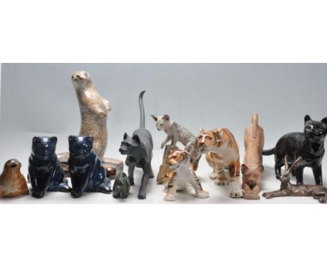 A collection of vintage retro 20th century ceramic porcelain figurines to include a Royal Dux tiger, a USSR bay tiger, cats f