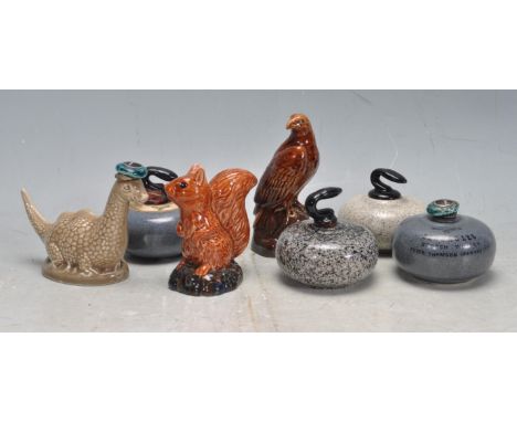 A collection of vintage 20th century ceramic Beneagles miniatures comprising of a Loch Ness monster squirrel, eagle and four 