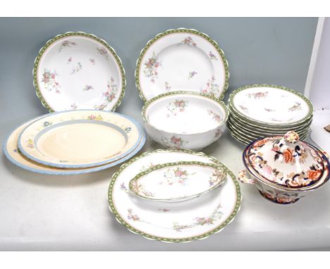 A collection of vintage china to include Limoge, two New hall large oval meat platters and a Mason Ironstone blue lidded ture