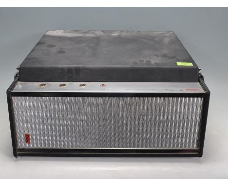 A vintage retro 20th century circa 1960’s Bush SRP51 record player. The record player having four speed Garrard model 3500 de