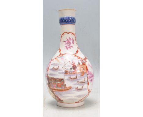 A 19th century Chinese oriental&nbsp;famille rose guglet vase with blue ring to the neck. The vase of a baluster form with tw