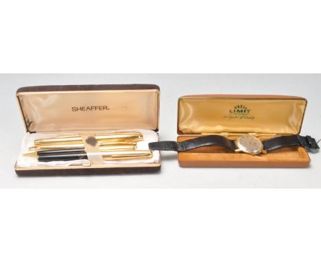 A collection of vintage retro 20th century  Sheaffer fountain pens, pencil and ball pen, all with gold plated body along with