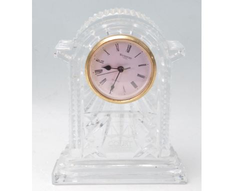 A 20th century crystal cut glass Waterford - Court Service mantle clock having an electronic movement set in a dome top case 