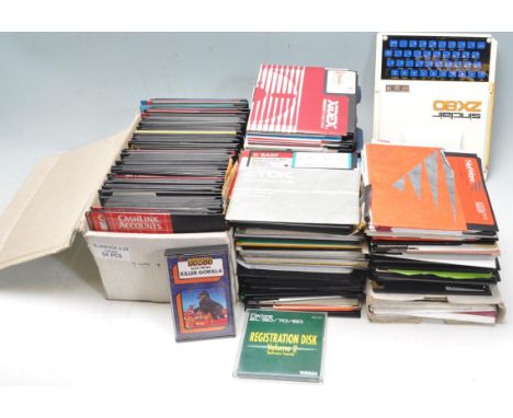A vintage retro 20th century circa 1970’s Sinclair ZX80 computer / personal computer along with a very large collection of fl