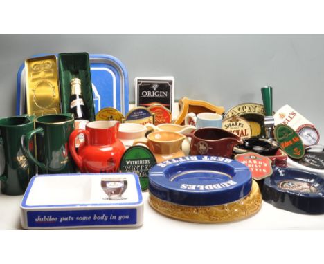 A large collection of vintage retro 20th century pub /&nbsp;breweriana advertising ware to include ashtrays, pump handles, pu