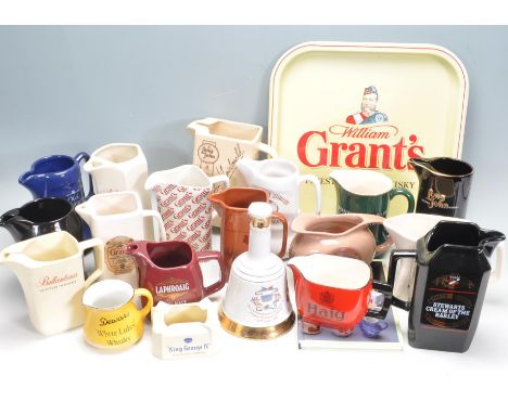 A large collection of vintage retro 20th century pub / breweriana advertising ware to include ashtrays, pump badges, jugs, et