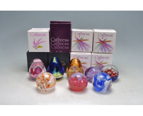 A collection of eight retro vintage late 20th century studio art glass Caithness paperweights to include Ribbons, Dream, Pebb