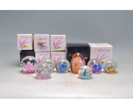 A collection of eight retro vintage late 20th century studio art glass Caithness paperweights to include Cinderella, Moonflow