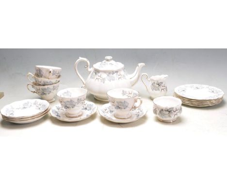 A vintage 20th century Royal Albert Silver Maple bone china tea set. The tea set comprising of teapot, cups, saucers, side pl