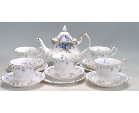 A vintage retro 20th century Royal Albert bone china tea set. The tea set comprising of five cups and saucer, three side plat