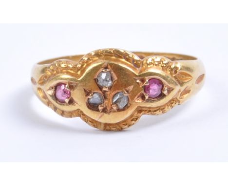 An antique hallmarked 18ct gold Edwardian diamond &amp; ruby ring bearing hallmarks for Chester 1901. Weighs; 2.5 grams Size 