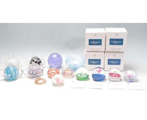 A large collection of vintage retro 20th century studio glass paperweights of various of and design to include paperweights i