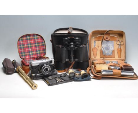 A collection of vintage 20th century curiosity items to include binoculars and opera glass, Tecnar 20 x 50, pocket telescope,